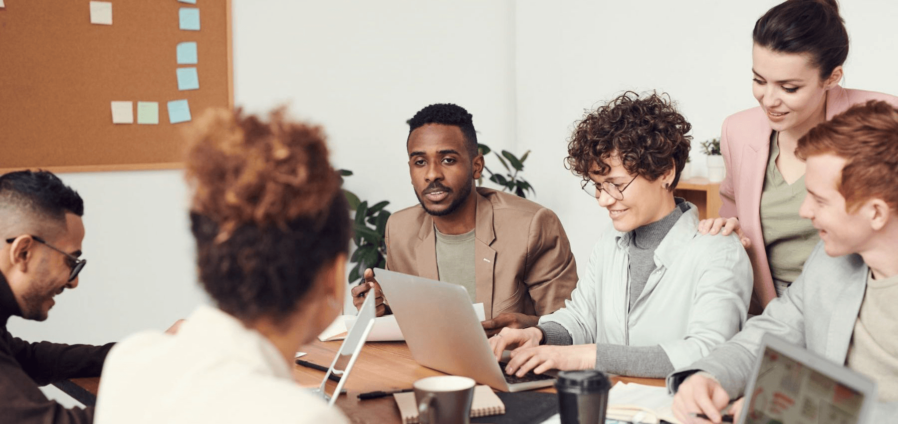 Group of people talking in a group job or meeting.